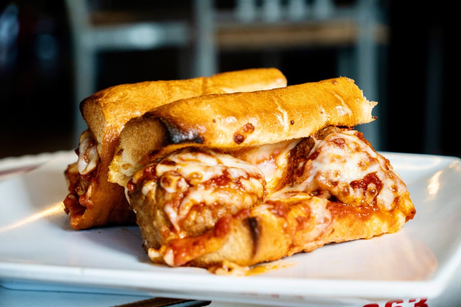 A toasted sub with melted cheese